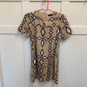 Tan dress with blue accents/belt